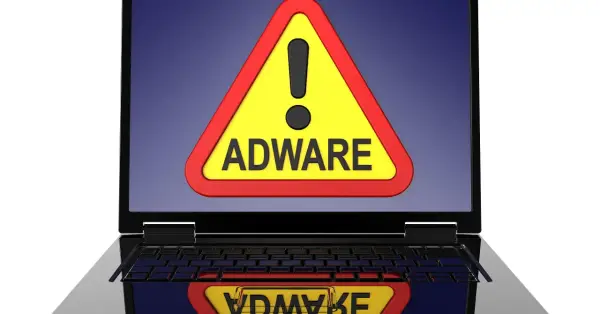 Warnung auf Laptop-Bildschirm: gelbes Dreieck mit Ausrufezeichen und dem Wort "ADWARE". Ein Adware-Virus ist eine Bedrohung.
